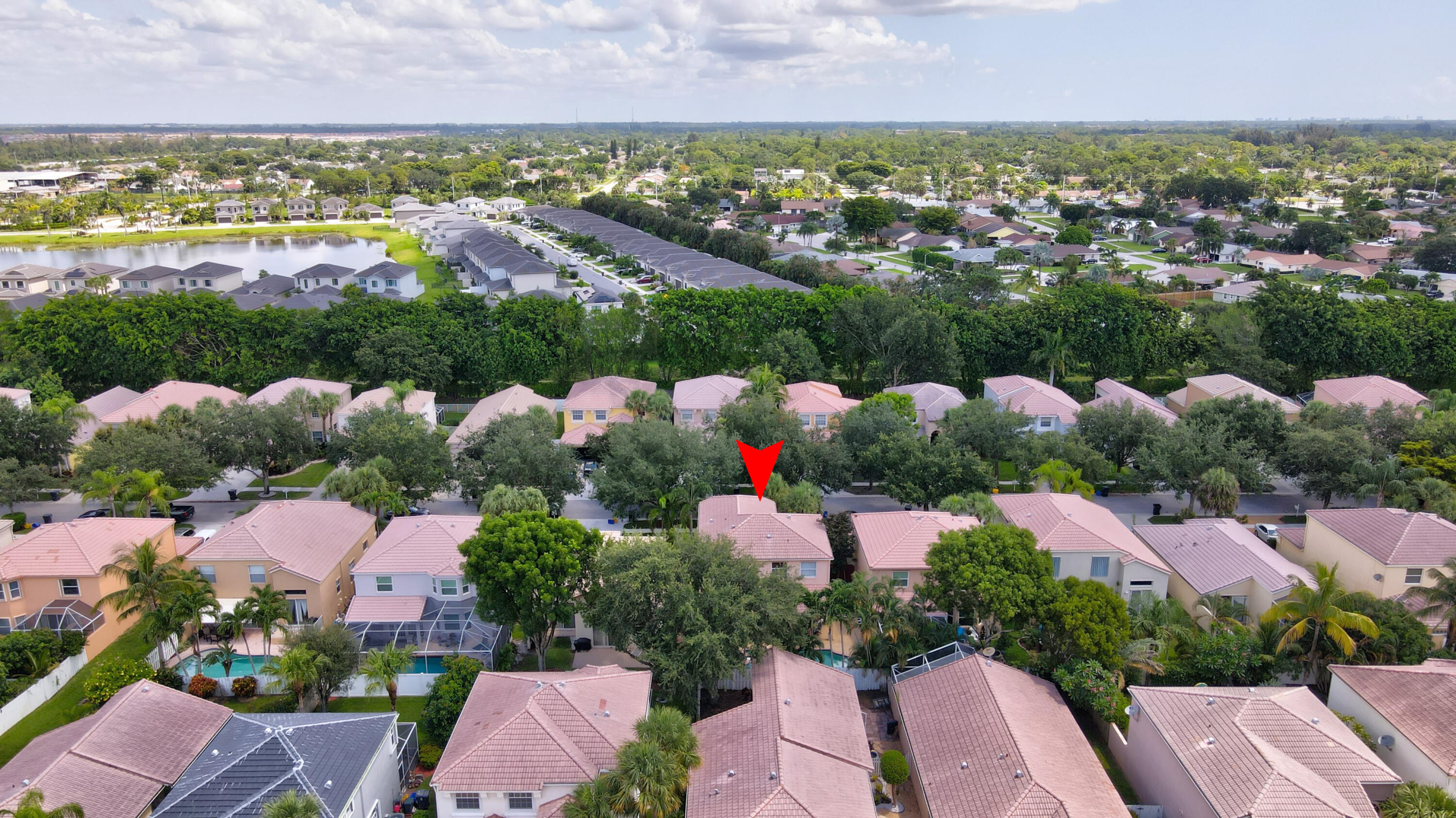 7855 Oak Grove Circle Lake Worth, FL 33467 - Photo 38 of 40 an aerial view of house with yard and swimming pool