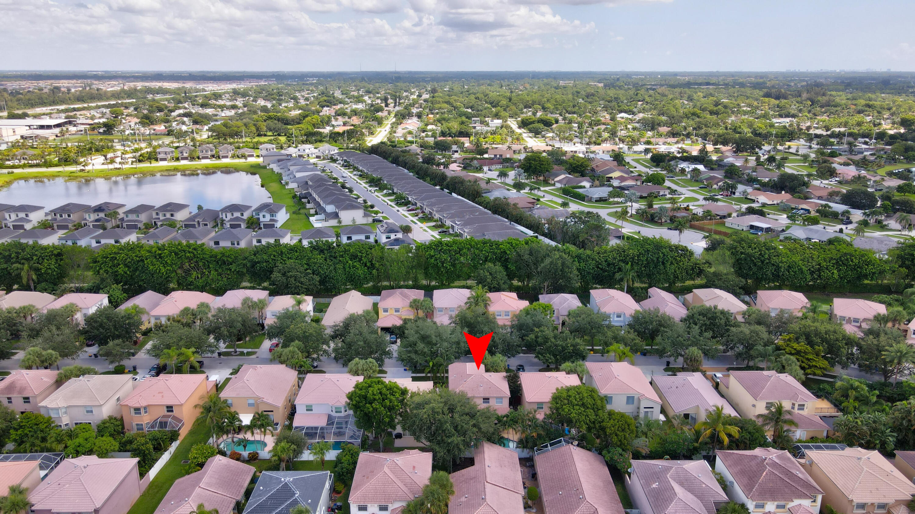 7855 Oak Grove Circle Lake Worth, FL 33467 - Photo 39 of 40 an aerial view of residential houses with outdoor space
