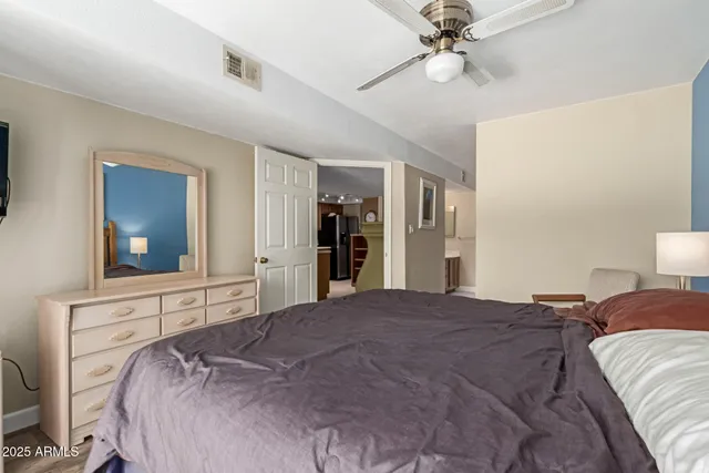 a bathroom with a sink double vanity and a mirror