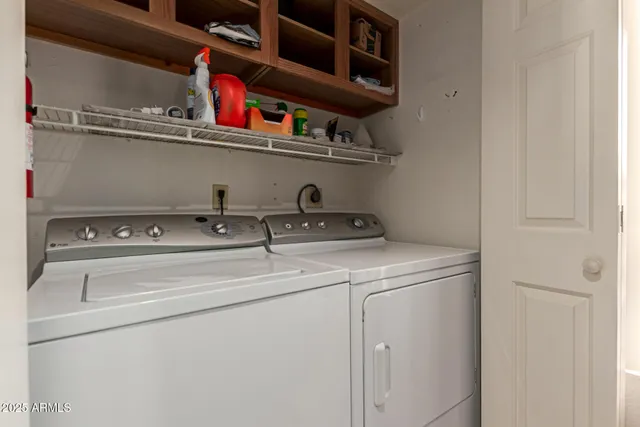 a view of balcony with a potted plant
