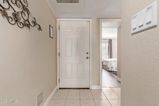 a view of a storage & utility room with closet