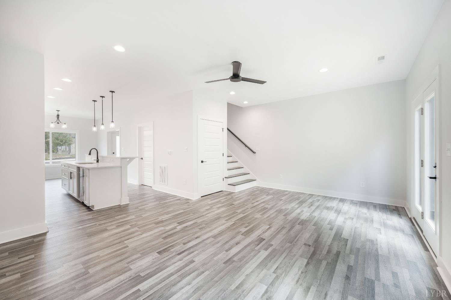 88 Allure Drive Rustburg, VA 24588 - Photo 15 of 58 a view of a kitchen with wooden floor and a sink