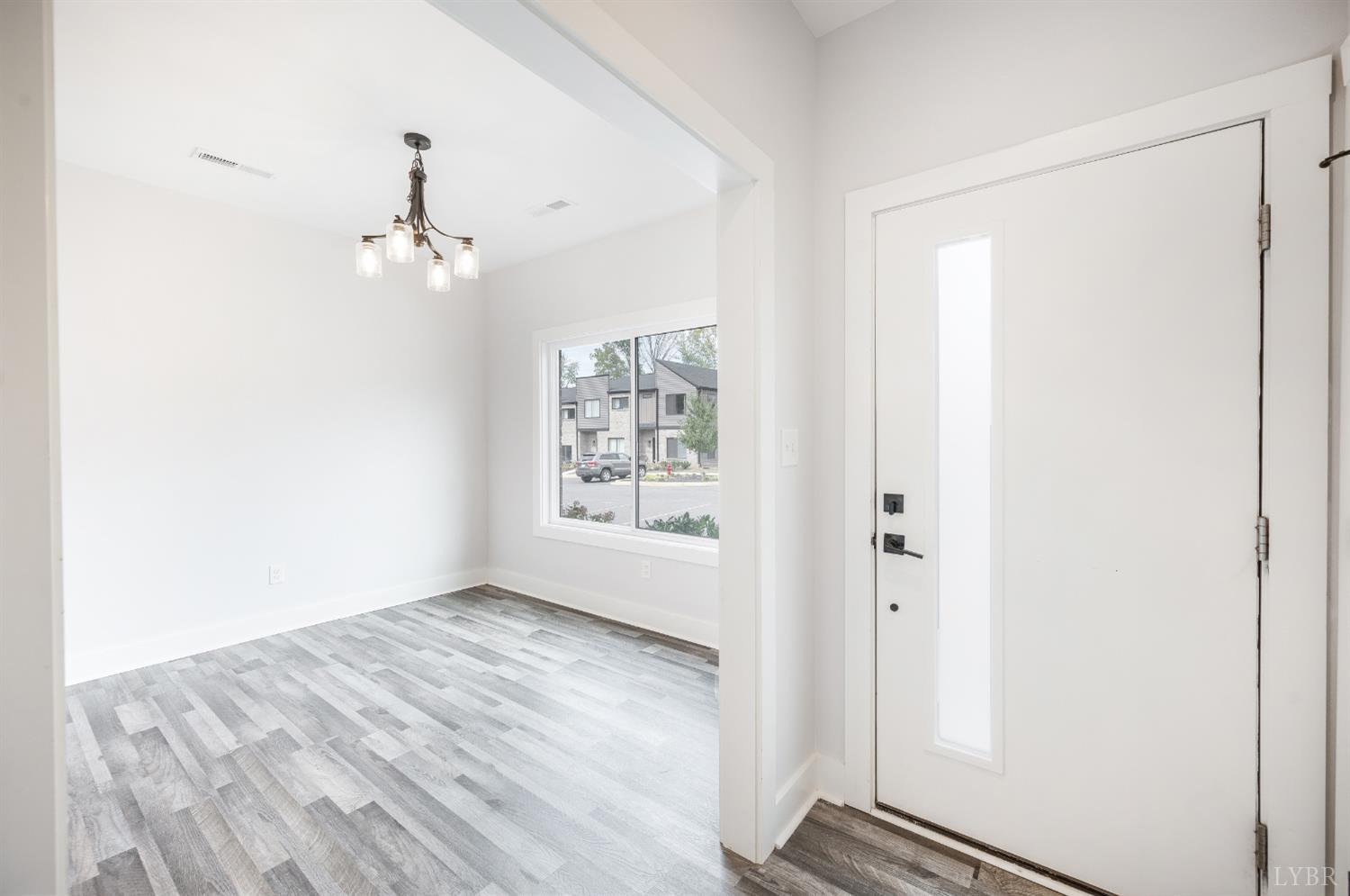 88 Allure Drive Rustburg, VA 24588 - Photo 21 of 58 an empty room with windows and cabinet