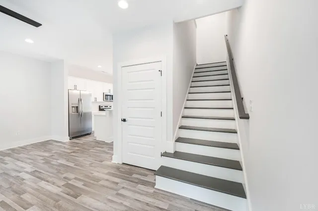 a bathroom with a sink toilet and mirror