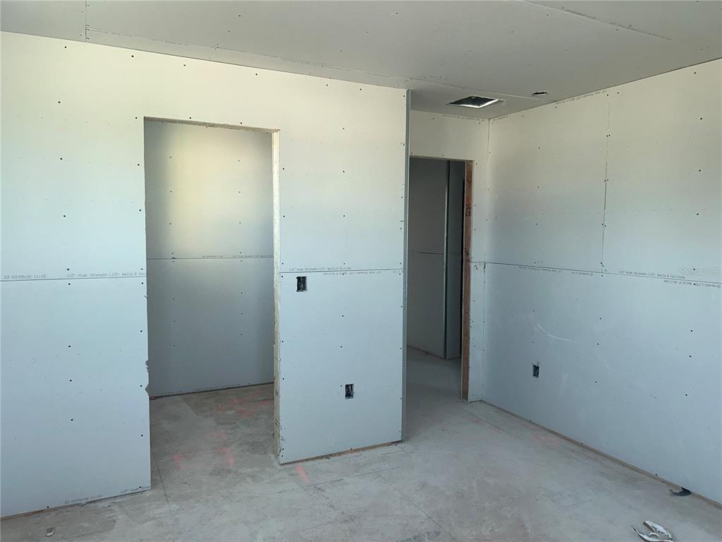 10123 Hidden Hammock Loop Parrish, FL 34221 - Photo 17 of 32 an empty room with closet area