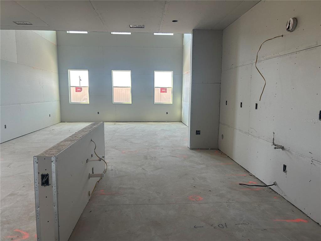 10123 Hidden Hammock Loop Parrish, FL 34221 - Photo 6 of 32 a view of a hallway with entryway and a window