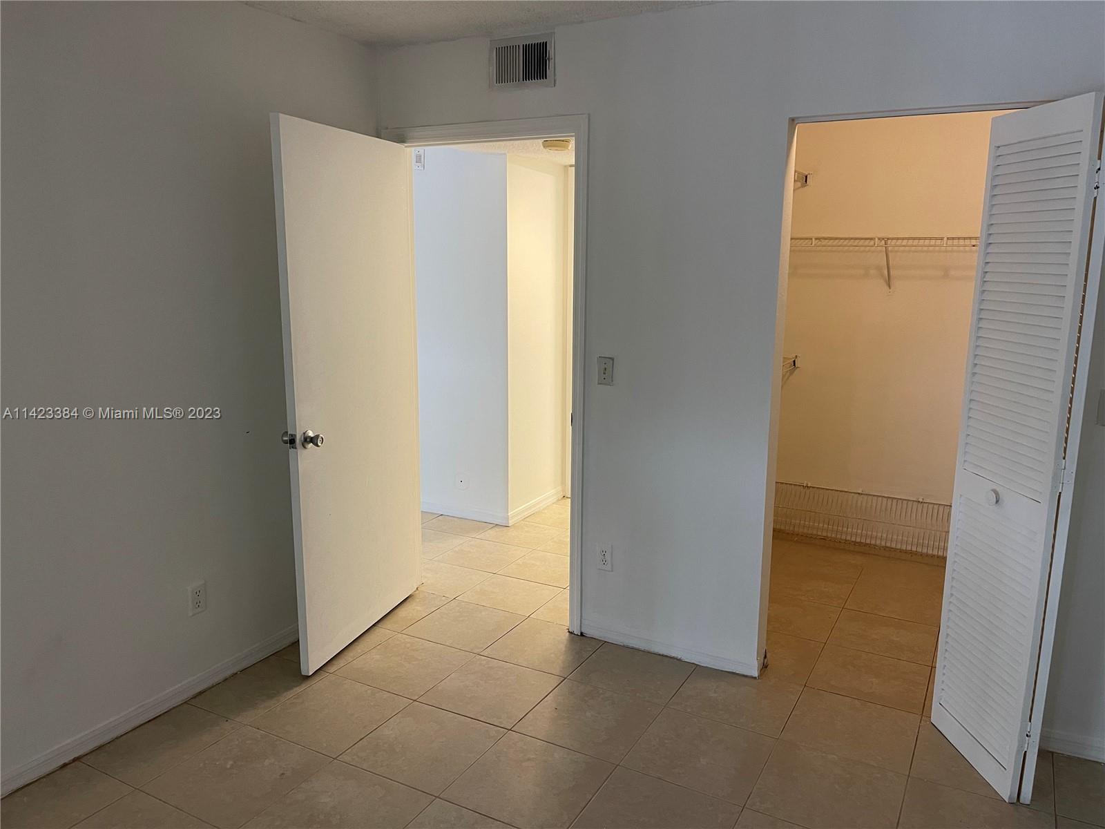 4045 West McNab Road, Unit G106 Pompano Beach, FL 33069 - Photo 14 of 23 a view of an empty room