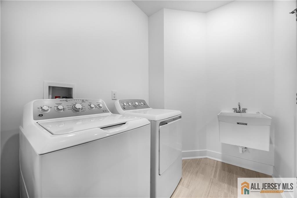 4 Prado Road Monroe Township, NJ 08831 - Photo 14 of 21 a utility room with dryer and washer