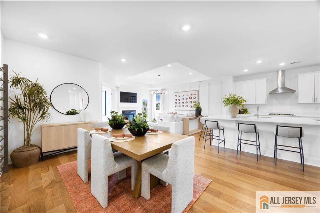 4 Prado Road Monroe Township, NJ 08831 - Photo 5 of 21 a living room with furniture a mirror and a table