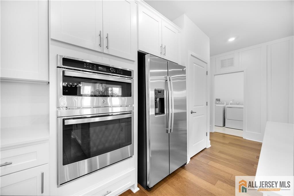 4 Prado Road Monroe Township, NJ 08831 - Photo 8 of 21 a kitchen with stainless steel appliances a stove and a refrigerator