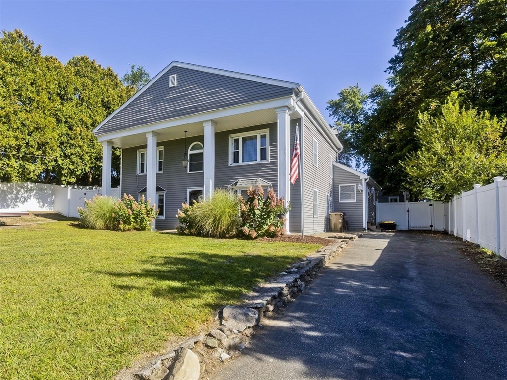 3 Fontaine Street Ludlow, MA 01056 - Photo 1 of 41 a front view of a house with a yard
