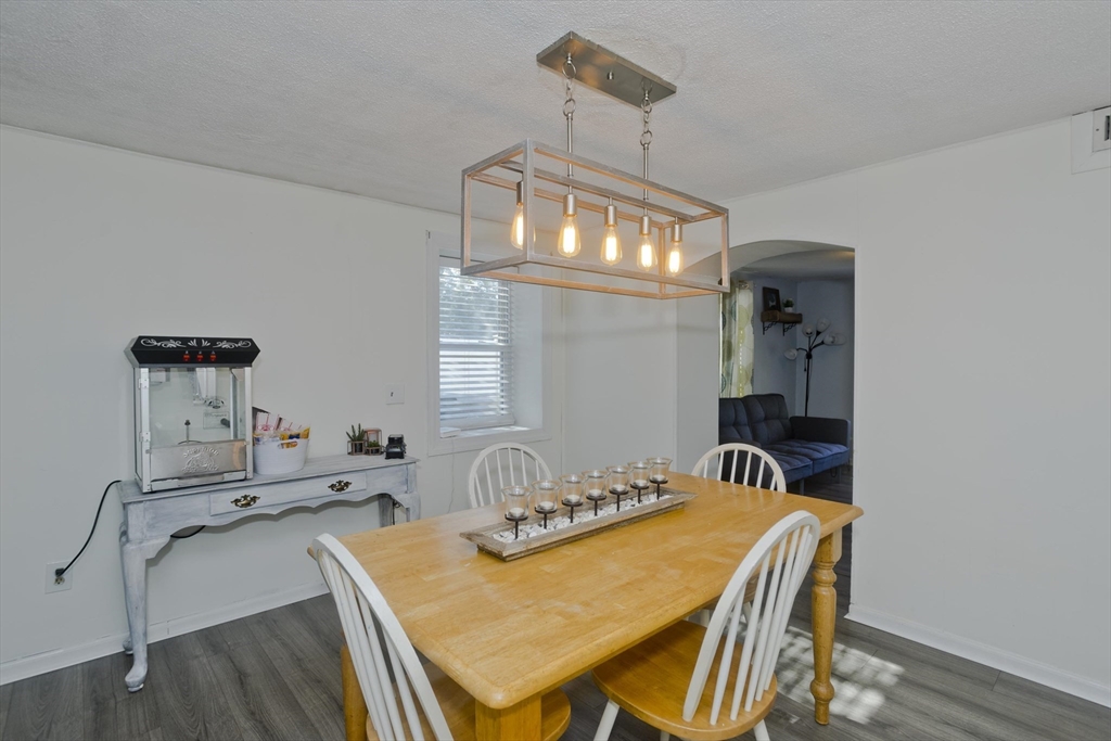 3 Fontaine Street Ludlow, MA 01056 - Photo 11 of 41 a dining room with furniture and wooden floor