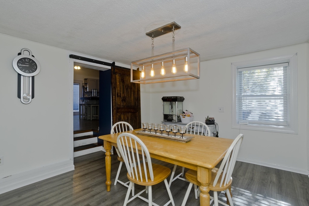 3 Fontaine Street Ludlow, MA 01056 - Photo 12 of 41 a view of a dining room with furniture and chandelier