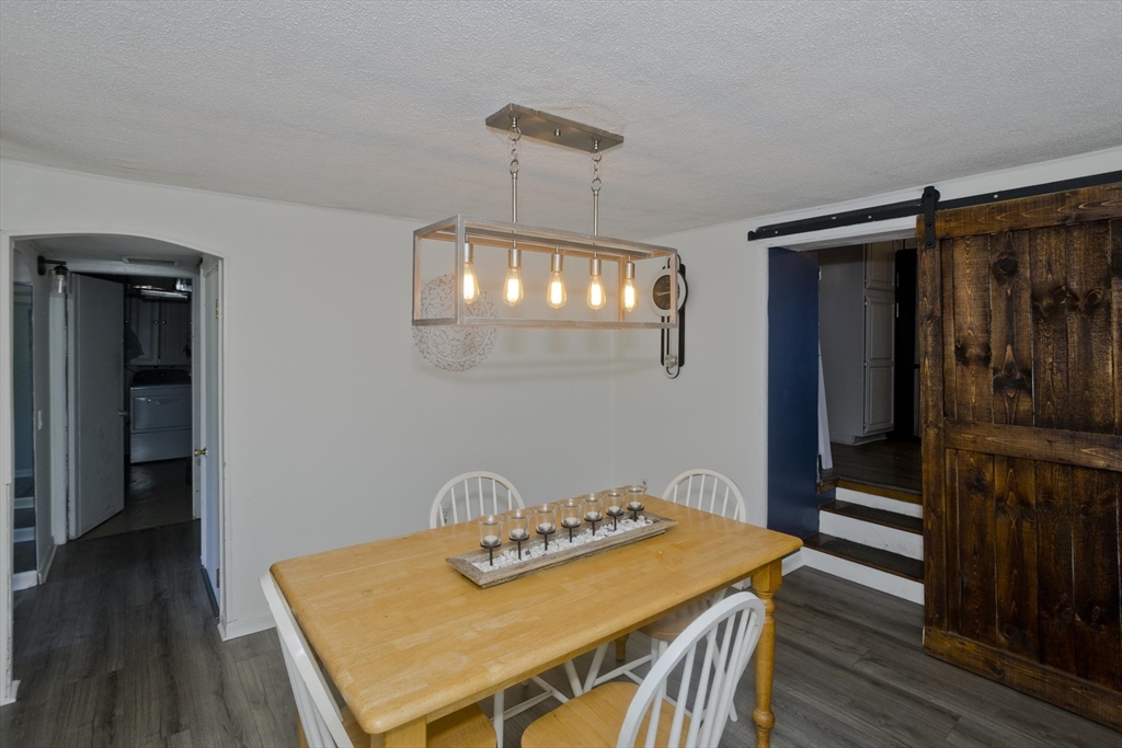 3 Fontaine Street Ludlow, MA 01056 - Photo 13 of 41 a dining room with a table and chairs