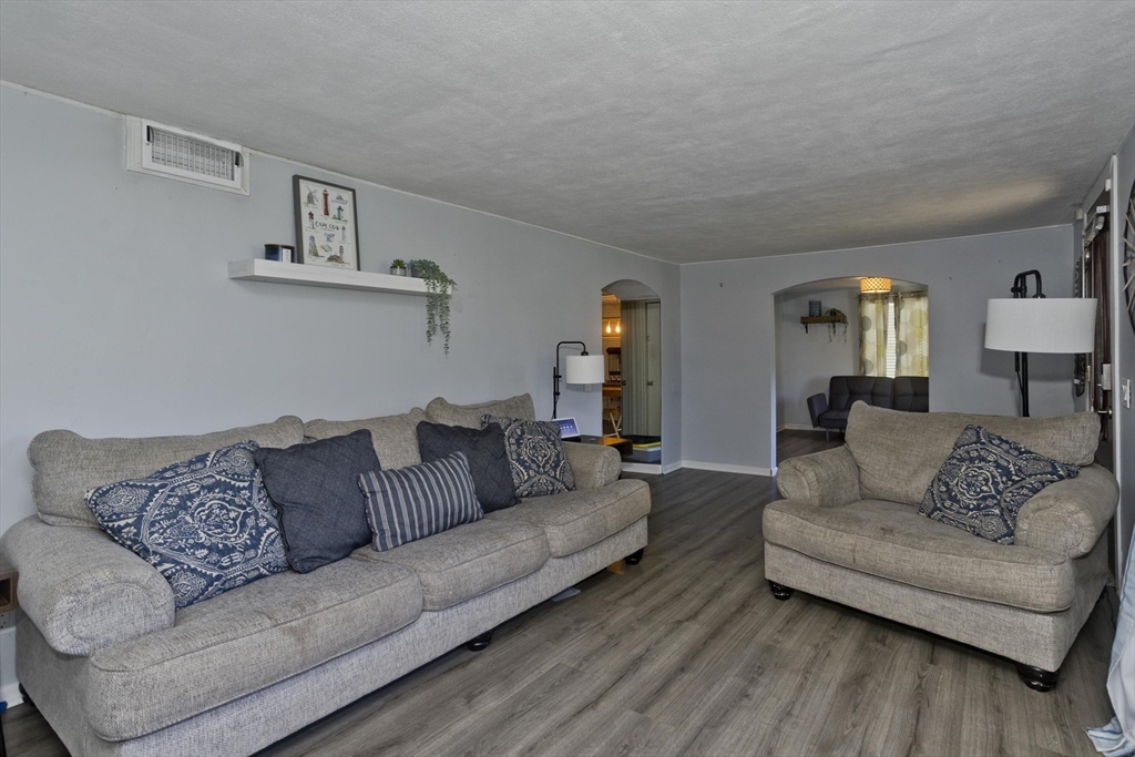 3 Fontaine Street Ludlow, MA 01056 - Photo 16 of 41 a living room with furniture and a couch