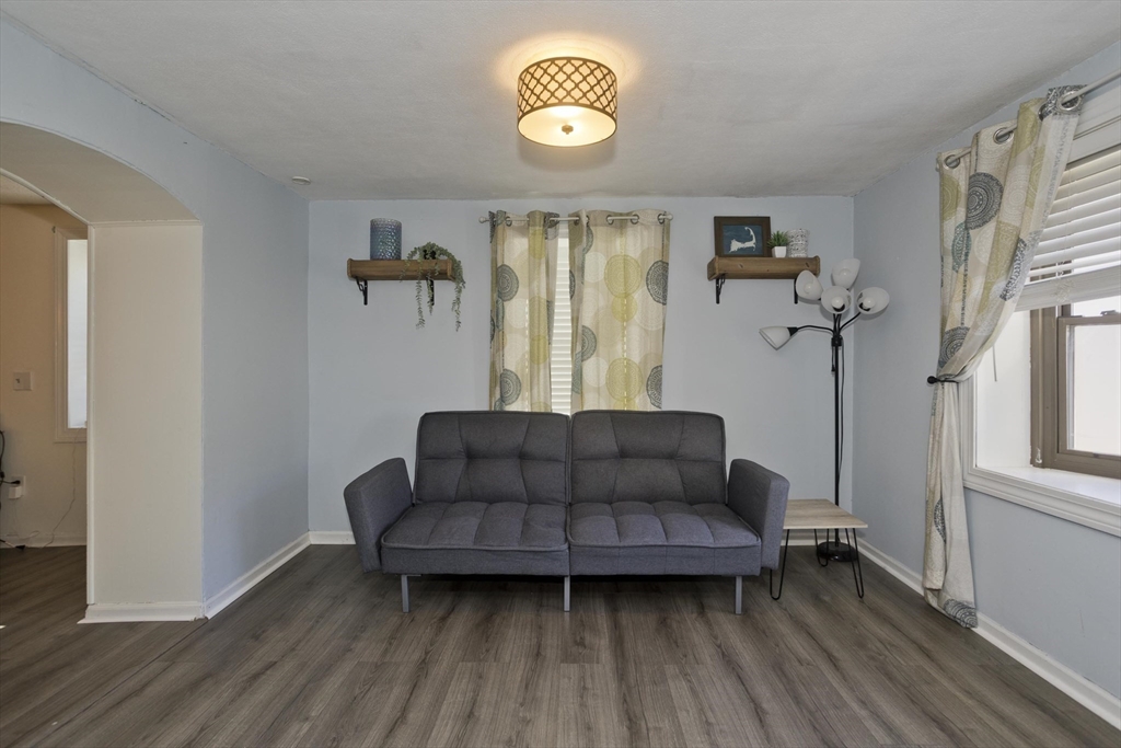 3 Fontaine Street Ludlow, MA 01056 - Photo 17 of 41 a living room with furniture and a window