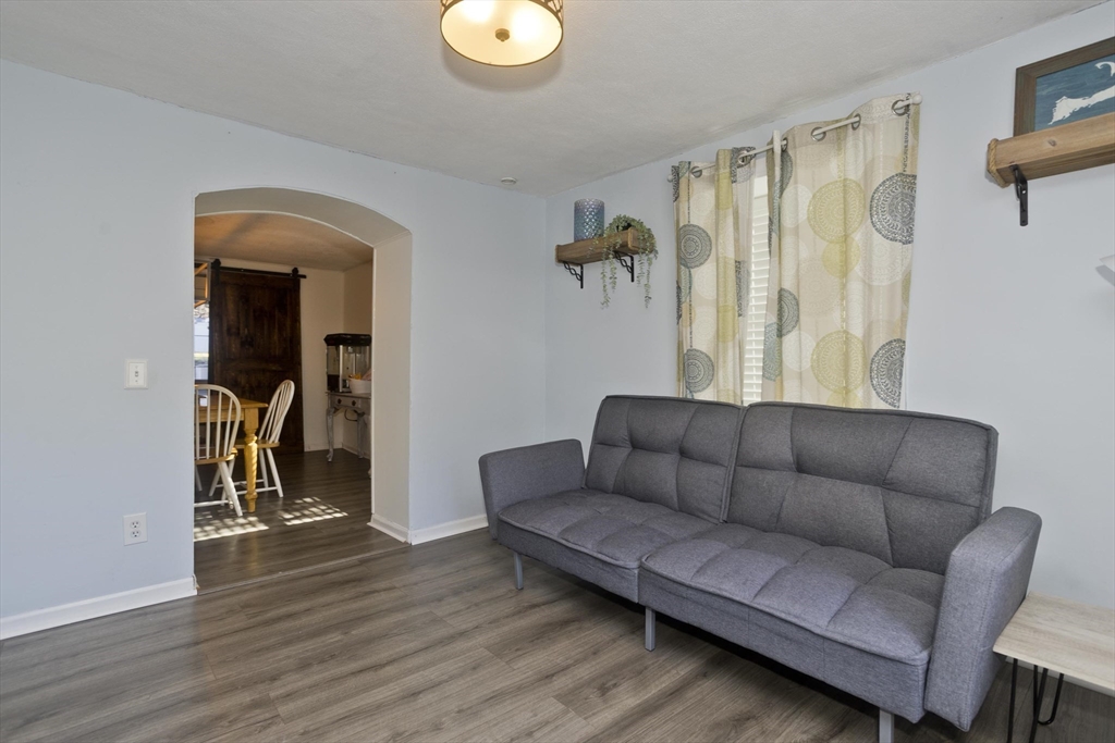 3 Fontaine Street Ludlow, MA 01056 - Photo 18 of 41 a living room with furniture and a wooden floor