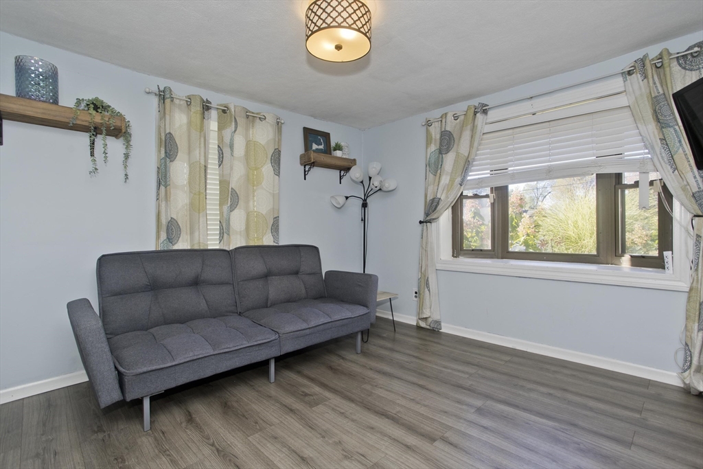 3 Fontaine Street Ludlow, MA 01056 - Photo 19 of 41 a living room with furniture and a window