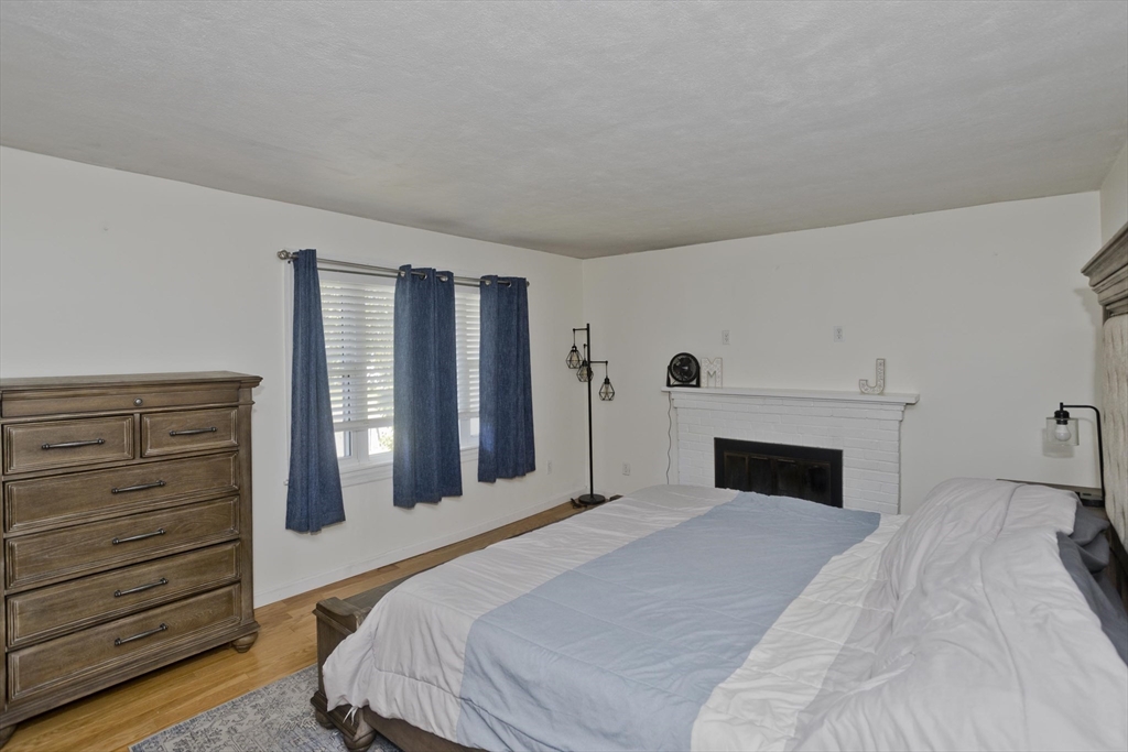 3 Fontaine Street Ludlow, MA 01056 - Photo 24 of 41 a bedroom with a bed and a dresser