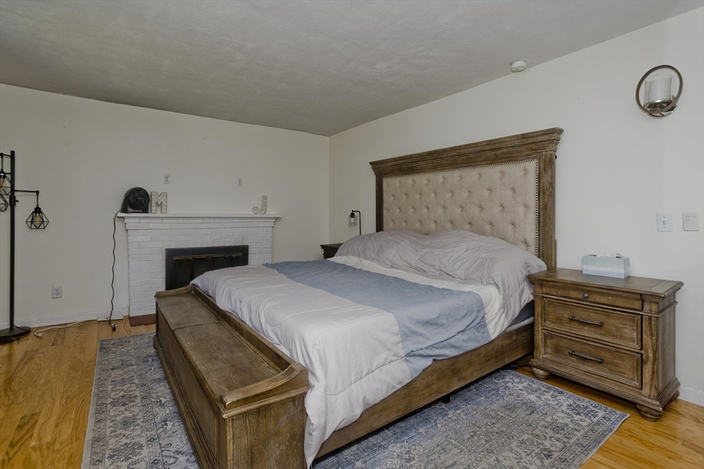 3 Fontaine Street Ludlow, MA 01056 - Photo 25 of 41 a bedroom with a bed and a dresser