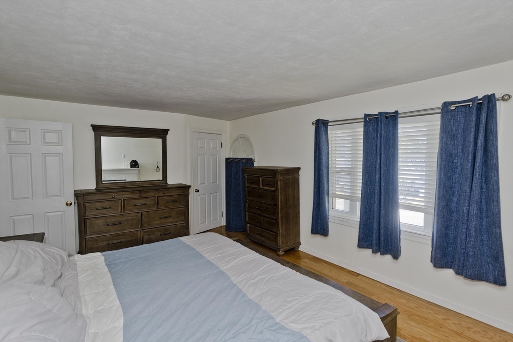 3 Fontaine Street Ludlow, MA 01056 - Photo 27 of 41 a bedroom with a bed and furniture