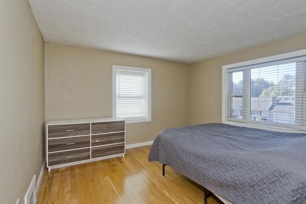 3 Fontaine Street Ludlow, MA 01056 - Photo 29 of 41 a bedroom with a bed and a window