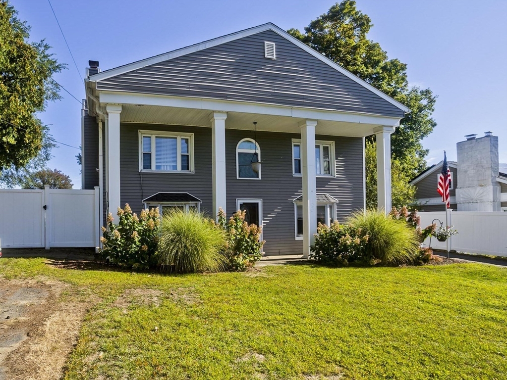 3 Fontaine Street Ludlow, MA 01056 - Photo 3 of 41 a front view of a house with a yard
