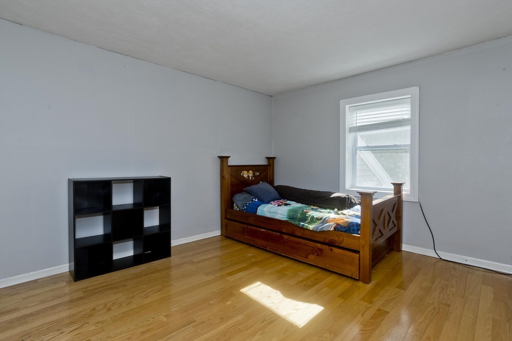 3 Fontaine Street Ludlow, MA 01056 - Photo 32 of 41 a living room with furniture and a wooden floor