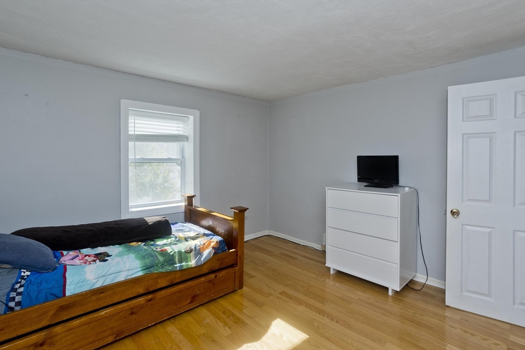 3 Fontaine Street Ludlow, MA 01056 - Photo 33 of 41 a bedroom with bed and a window