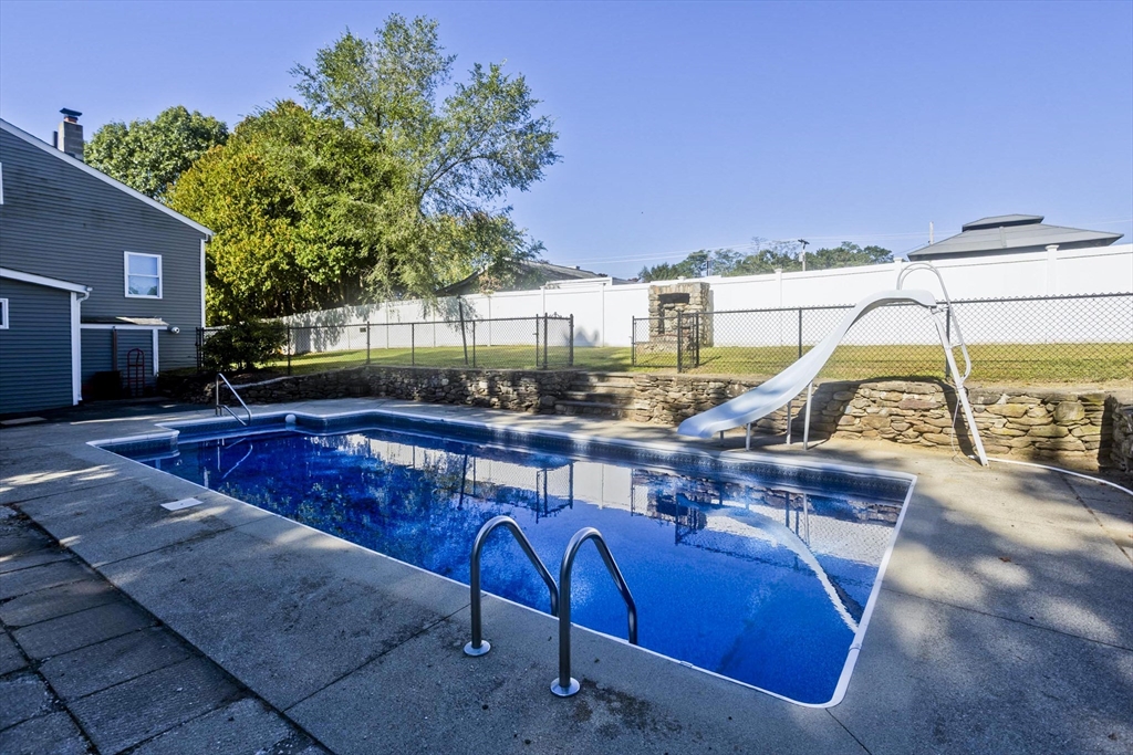 3 Fontaine Street Ludlow, MA 01056 - Photo 36 of 41 a view of a swimming pool with a lounge chairs