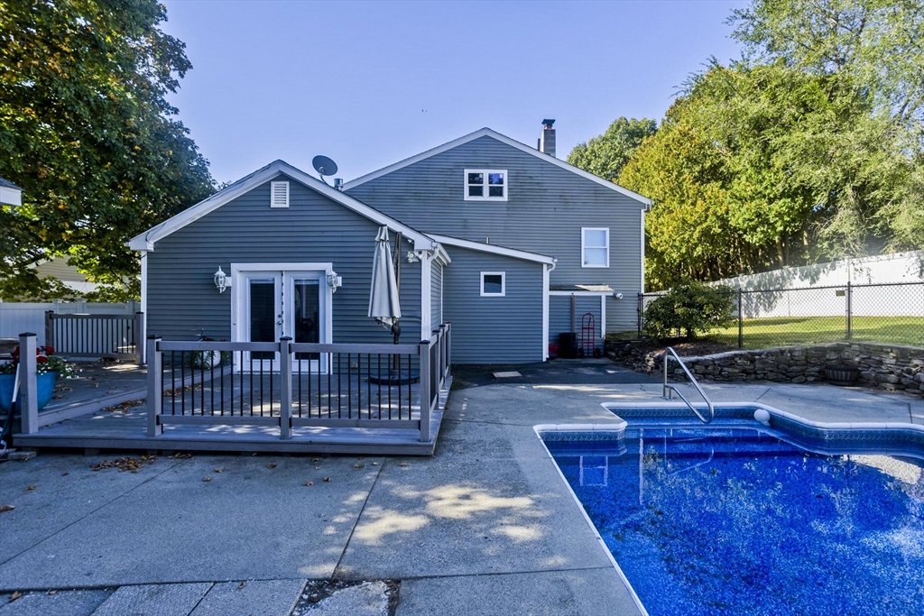 3 Fontaine Street Ludlow, MA 01056 - Photo 38 of 41 a view of a house with a wooden deck and a yard