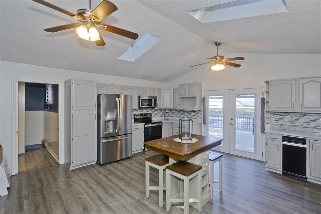 3 Fontaine Street Ludlow, MA 01056 - Photo 5 of 41 a view of a dining room with furniture a chandelier and wooden floor
