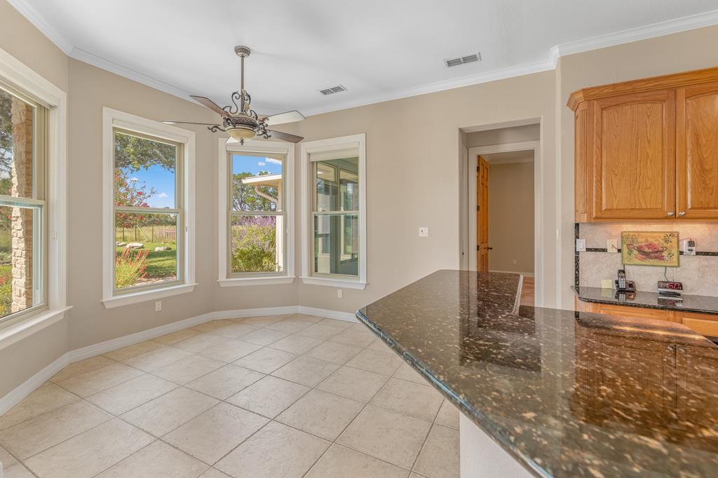 1662 Landmark Kerrville, TX 78028 - Photo 14 of 30 a view of a kitchen with granite countertop cabinets