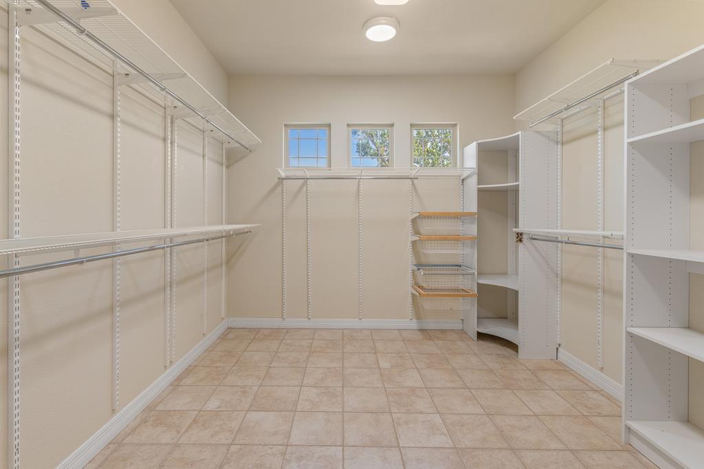 1662 Landmark Kerrville, TX 78028 - Photo 19 of 30 a view of a closet area with racks on the wall