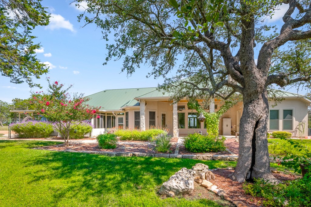 1662 Landmark Kerrville, TX 78028 - Photo 6 of 30 a front view of a house with garden