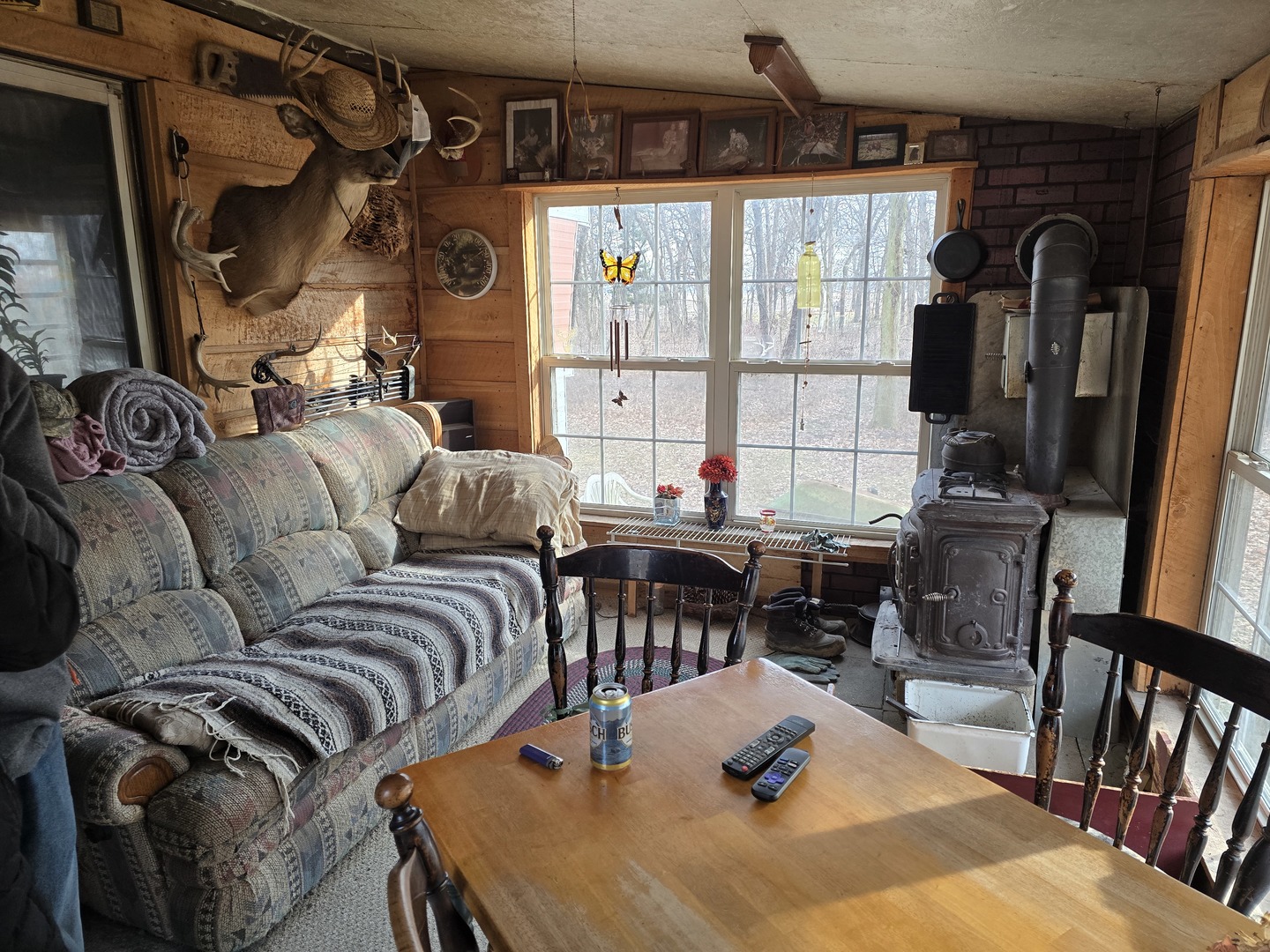 3669 East 2075th Road Serena, IL 60549 - Photo 7 of 15 a living room with furniture fireplace and a window