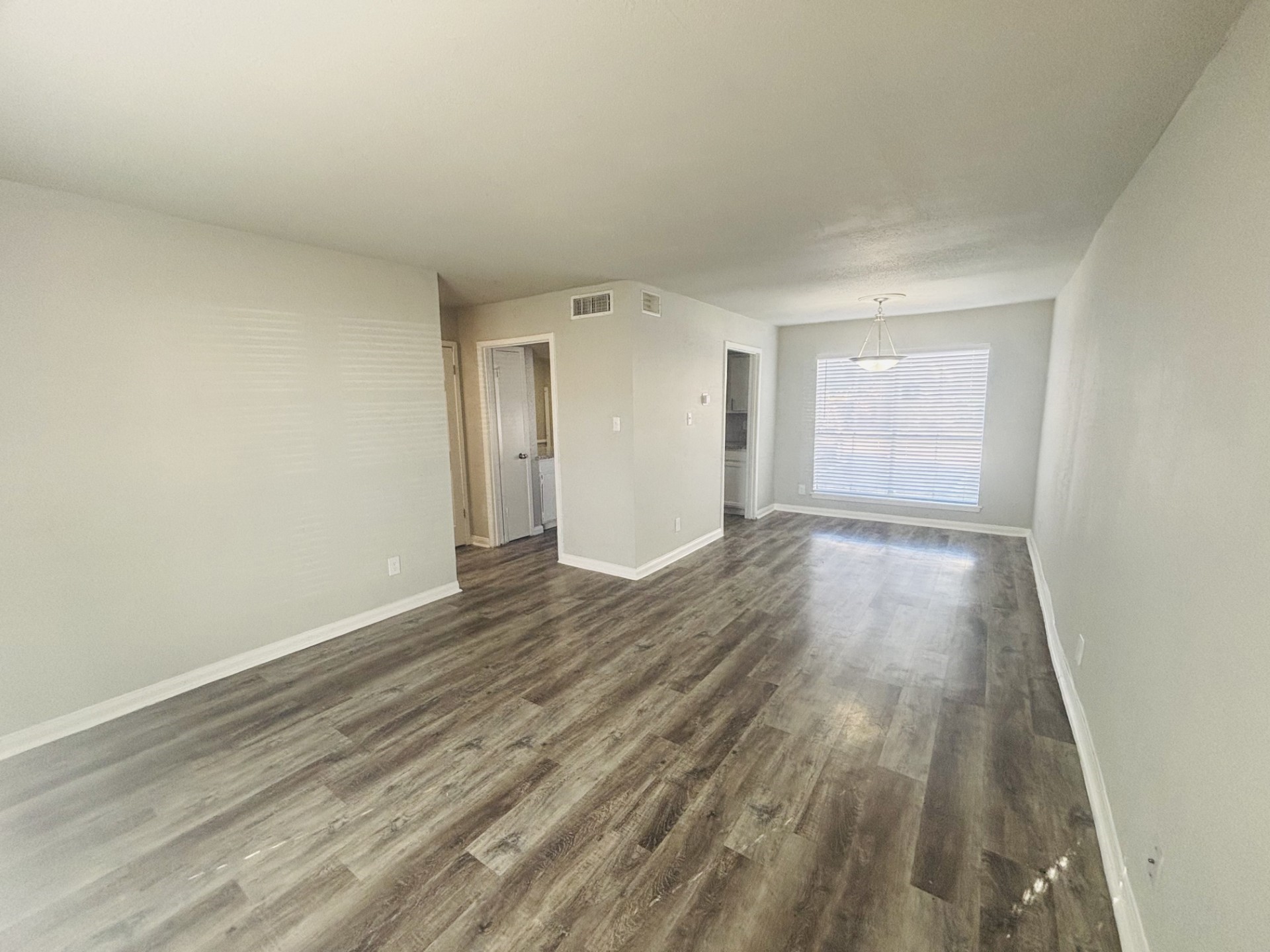 6200 West Tidwell Road, Unit 1109 Houston, TX 77092 - Photo 8 of 18 wooden floor in an empty room