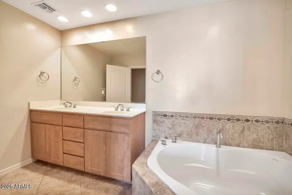 a bathroom with a sink and a bathtub
