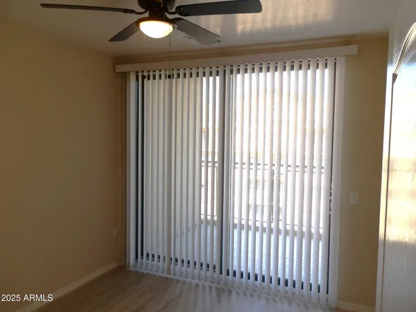 a view of a room that has a window in it