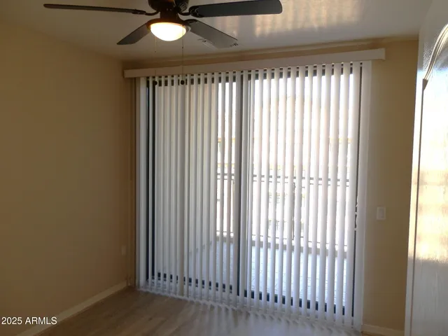 a view of a room that has a window in it