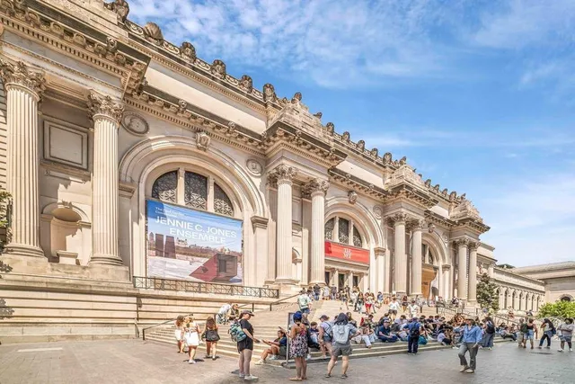 a view of a swimming pool with an outdoor seating