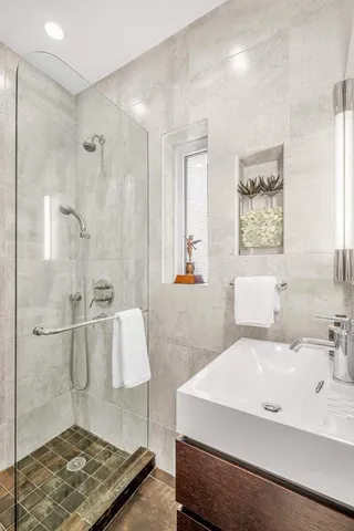 a kitchen with a sink stove and refrigerator