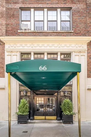 a bathroom with a sink a shower and a mirror