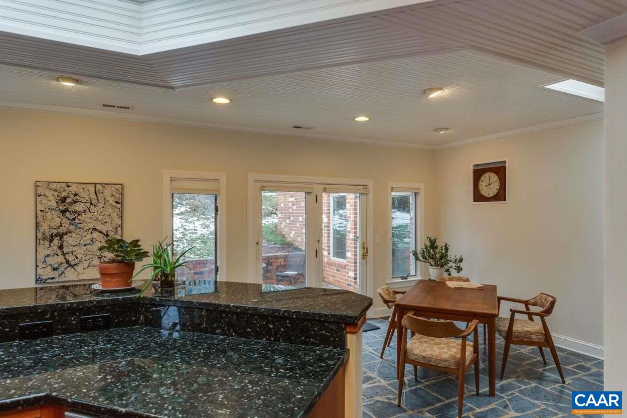 1861 Field Road Charlottesville, VA 22903 - Photo 16 of 49 a living room with furniture and wooden floor