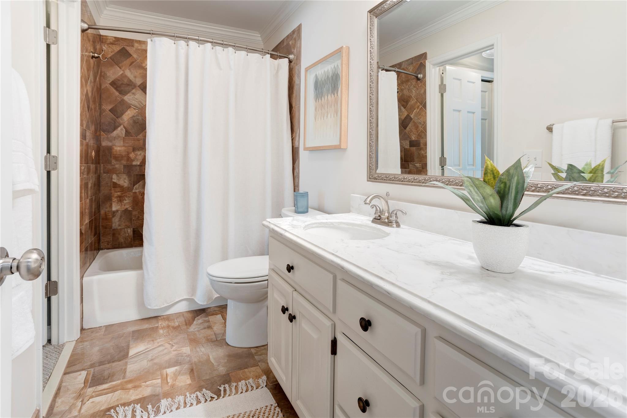 1188 Fawn Ridge Road Northwest Concord, NC 28027 - Photo 26 of 38 a bathroom with a granite countertop sink toilet and shower