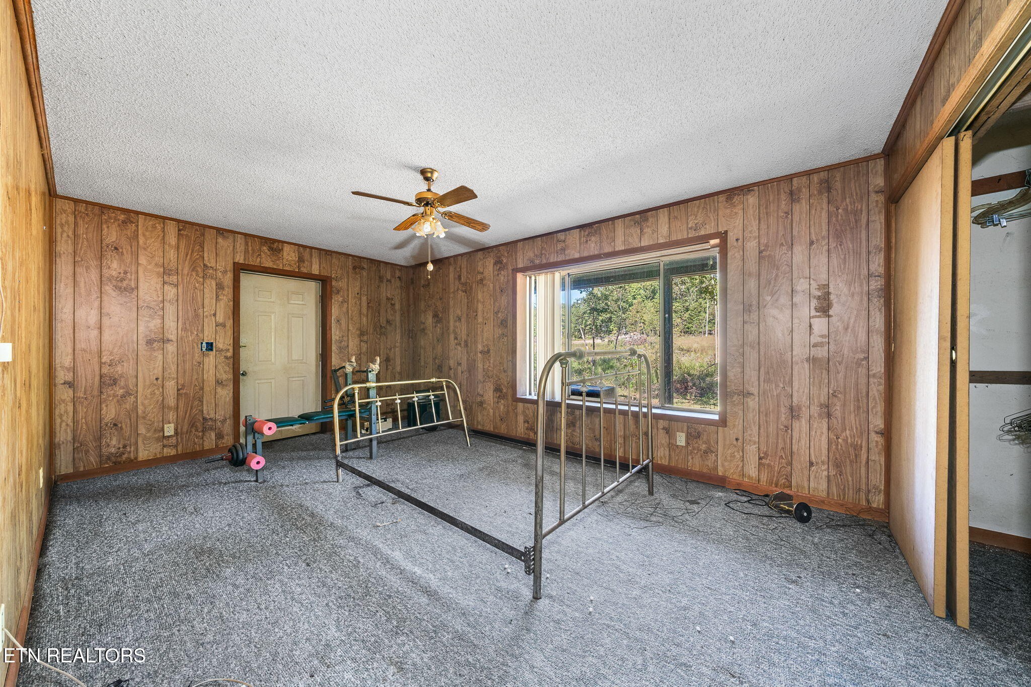 1602 Hollis Poore Road Jamestown, TN 38556 - Photo 8 of 25 a view of an empty room with a window