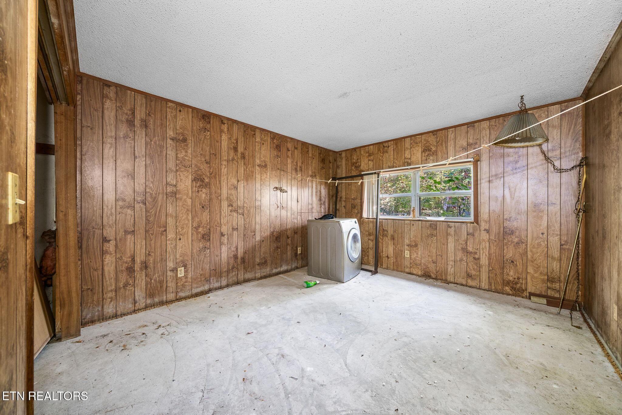 1602 Hollis Poore Road Jamestown, TN 38556 - Photo 10 of 25 a view of an empty room with a window