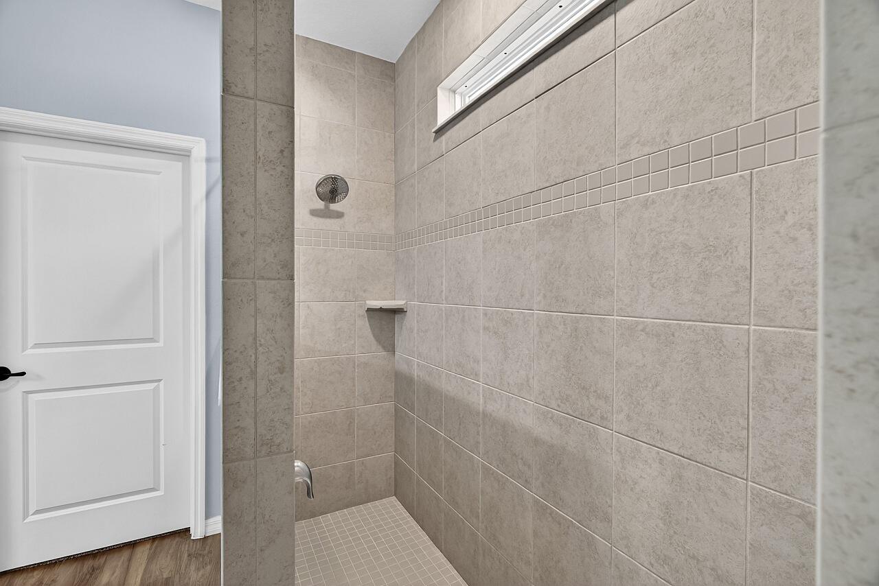313 Sandcrest Circle Sebastian, FL 32958 - Photo 26 of 42 a bathroom with a shower