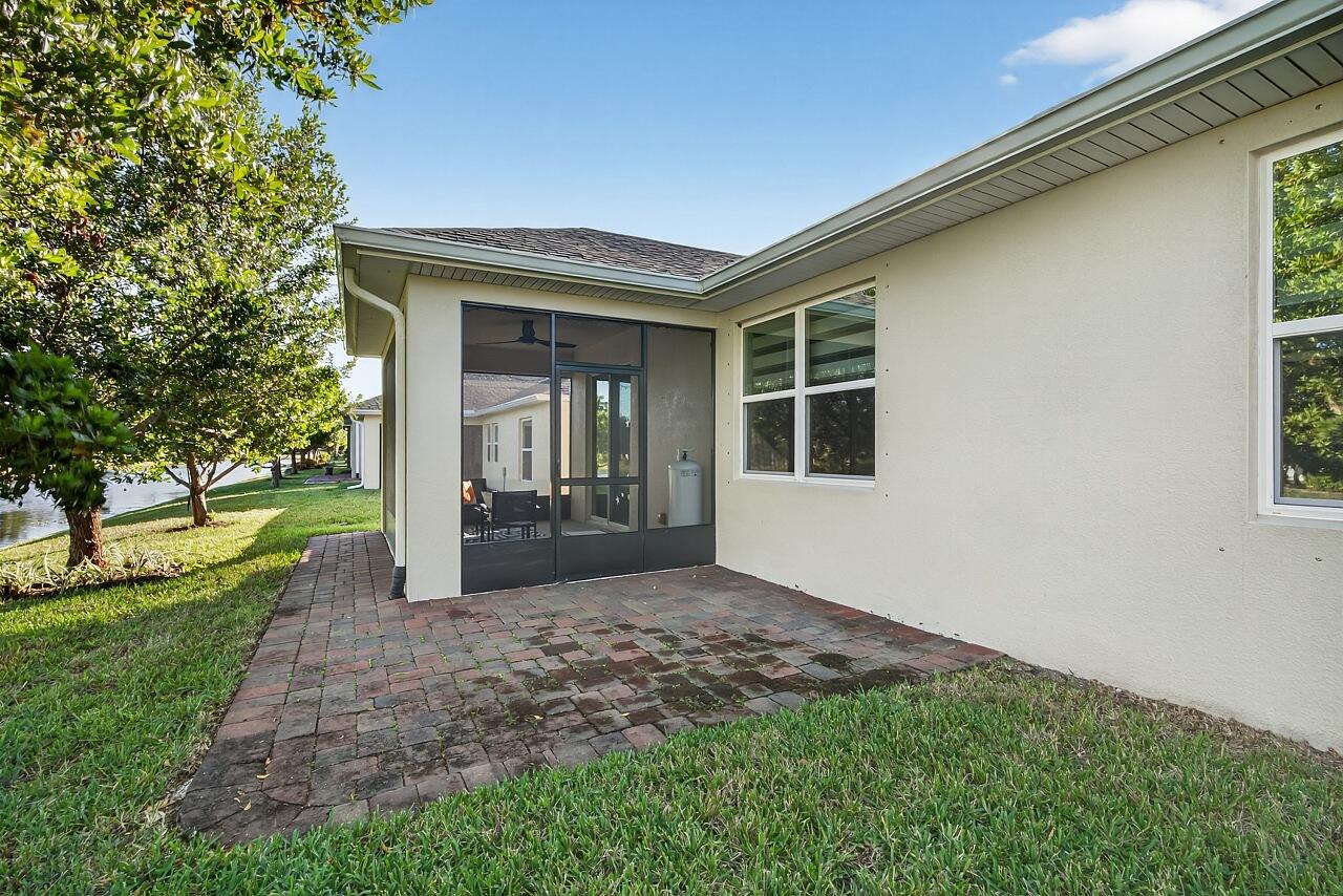 313 Sandcrest Circle Sebastian, FL 32958 - Photo 34 of 42 a view of a house with a garden