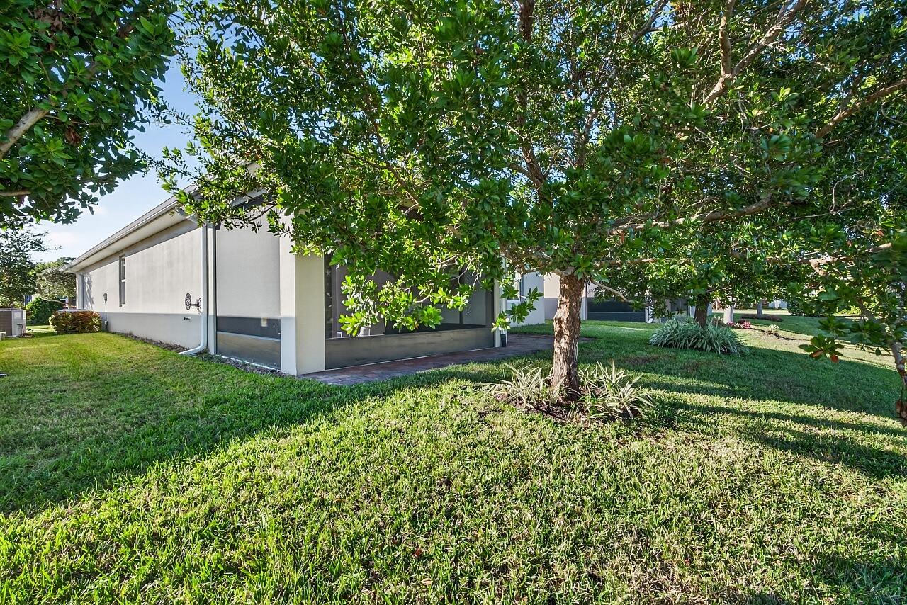313 Sandcrest Circle Sebastian, FL 32958 - Photo 35 of 42 a house view with garden space